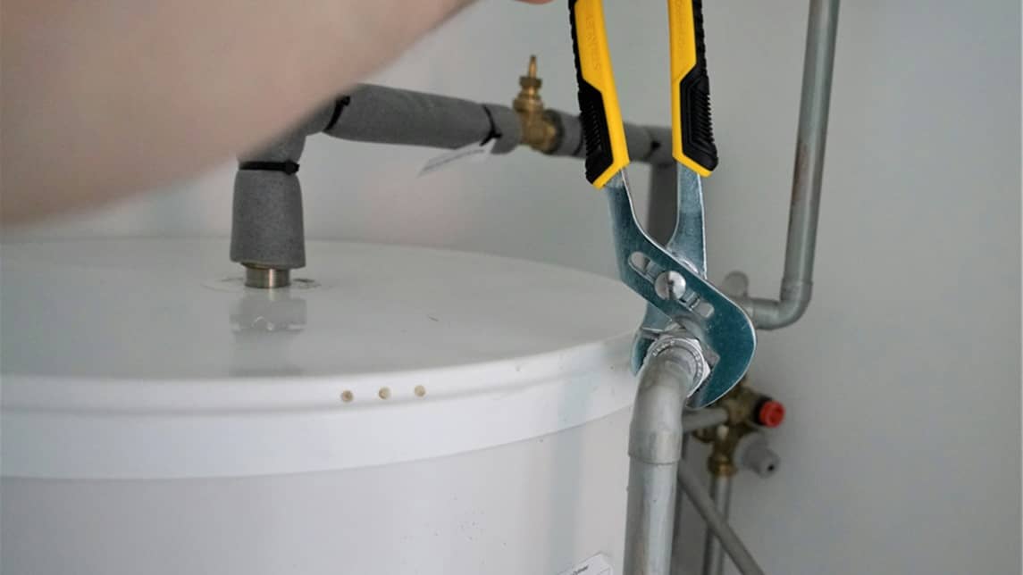 Tightening a nut with a wrench